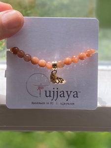 Pink sunstone with gold moon, gold heart, silver lotus